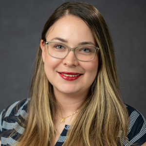 Patricia Montemayor smiling at camera.