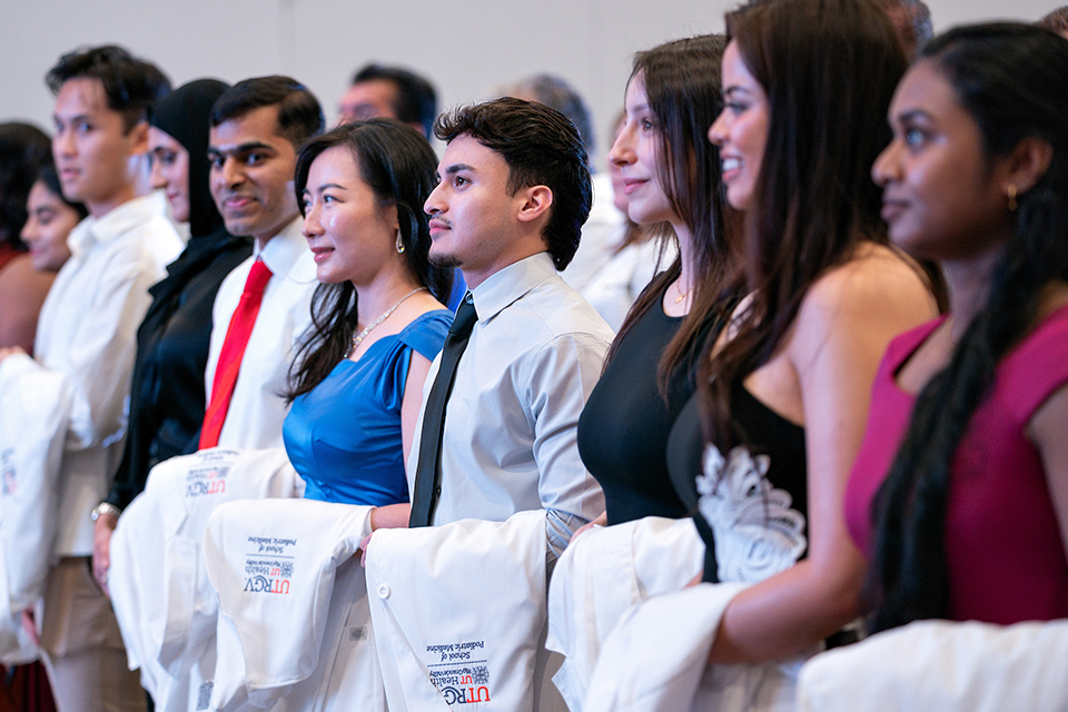 Students helping patient