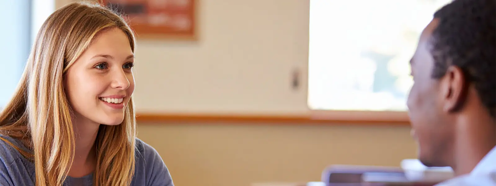 student speaking with an advisor