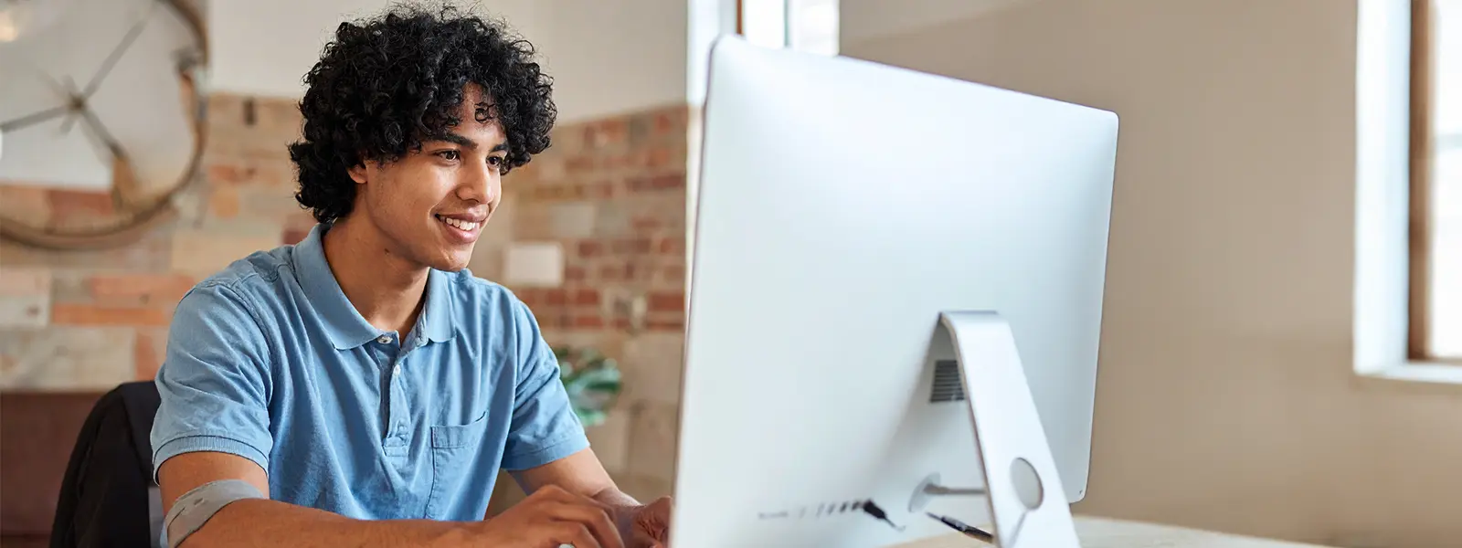 student doing homework on the computer