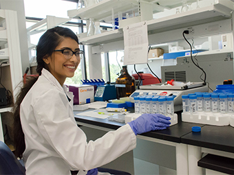 A soil science student in the laboratory