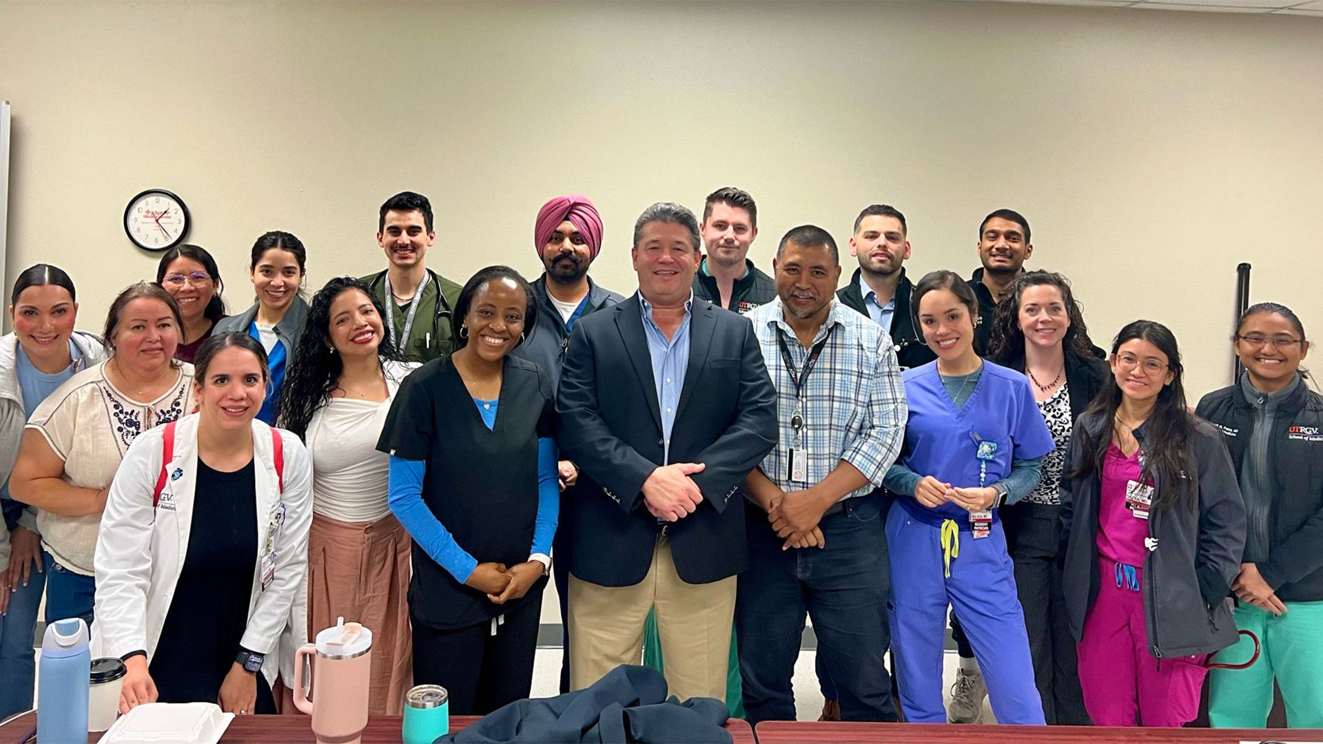 Group photo of diverse healthcare professionals.