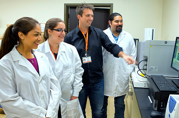 Dr. Mathew Johnson and scientistst in the lab