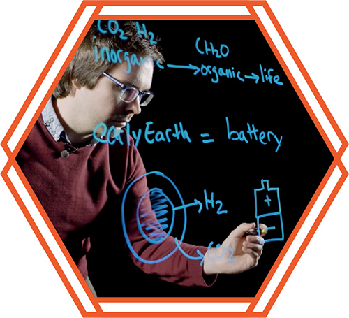 person_writing_equations.jpg