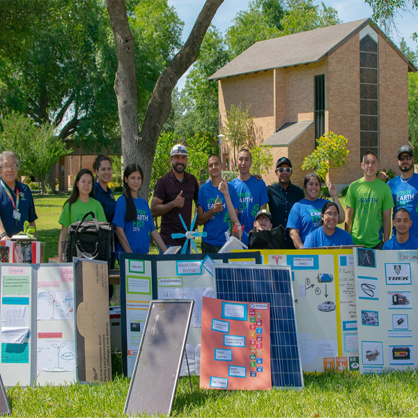 a group photo of people behind poster boards that were displayed during Earth Fest 2019