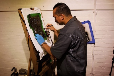 Customized airbrushing on t-shirts by Serkit Studios