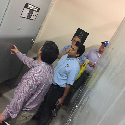 photo of men pointing and discussing for the demand response feasible study hosted by UTRGV