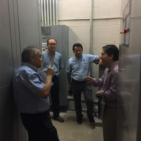 photo of men discussing for the demand response feasible study hosted by UTRGV