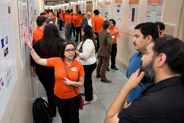 PREM students at UTRGV present their research posters during a National Science Foundation visit in 2017. The UTRGV PREM program and its research is funded by a $4.2 million grant from the NSF and is made possible for a third six-year cycle starting July 2021. (UTRGV Archival Photo by Paul Chouy)
