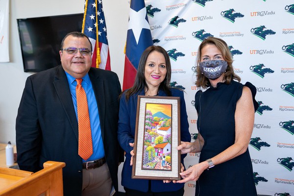 UTRGV and the Universidad Luterana Salvadoreña (ULS) in San Salvador, El Salvador signed a Memorandum of Understanding on Wednesday, Sept. 15, in Edinburg to expand educational opportunities for students and faculty on both campuses. Pictured are Dr. Luis Torres-Hostos, founding dean, UTRGV School of Social Work; Ada Ruth Gonzalez, director of International Relations, ULS; and Dr. Janna Arney, UTRGV deputy president and interim provost. Gonzalez presented Arney and Torres-Hostos with a special painting to commemorate the day.