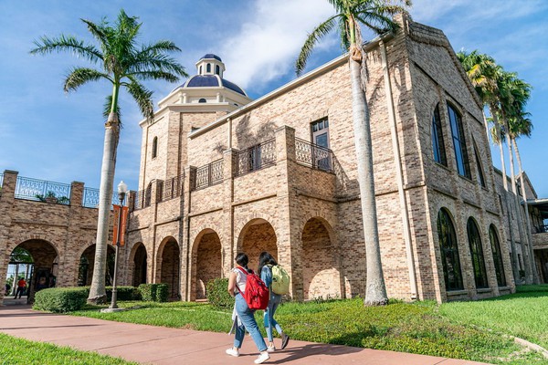 Two female students by the BMAIN on the Brownsville Campus