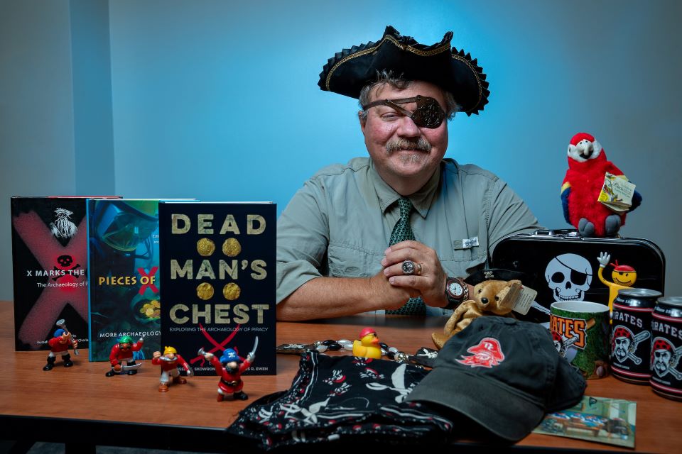 Dr. Russell K. Skowronek, a history and anthropology professor at The University of Texas Rio Grande Valley, co-edited his third pirate book titled “Dead Man’s Chest: Exploring the Archaeology of Piracy.” (UTRGV Photo by Paul Chouy)