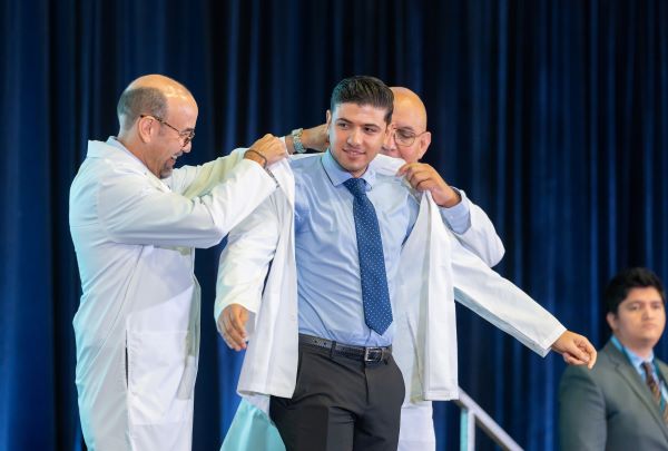 The UTRGV School of Podiatric Medicine hosted their second white coat ceremony held Oct. 27 at the Harlingen Convention Center. This is the second cohort for the UTRGV School of Podiatric Medicine – which is the only one in Texas and one of only 10 in the United States. It has 36 students – 18 female and 18 male – and is 100 percent Texan. Nine are from the Rio Grande Valley. And half of the new SOPM Class of 2027 are the first in their families to attend graduate school. (UTRGV photo by David Pike)
