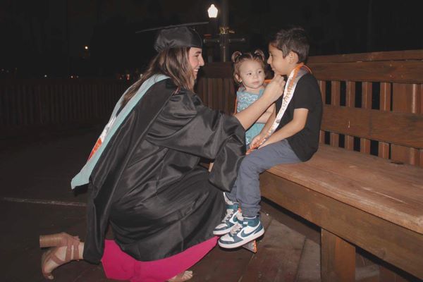 Genesis Carpio, head band director at Sen. Eddie A. Lucio Jr. Middle School in Brownsville, will earn a Master of Education in Educational Technology degree at UTRGV this weekend. Carpio is mother to daughter Mayte, 1, and son Mateo, 5. Carpio will be one of UTRGV's 50,000 graduates since its first commencement in 2015. (Courtesy Photo)