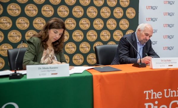 Laredo College President Dr. Minita Ramirez and UTRGV President Guy Bailey signed agreements on Thursday, March 30, to facilitate the admissions process and a seamless transfer of courses for Laredo College and UTRGV students. The signing ceremony was held at the Laredo College Ft. McIntosh campus. (UTRGV Photo by David Pike).