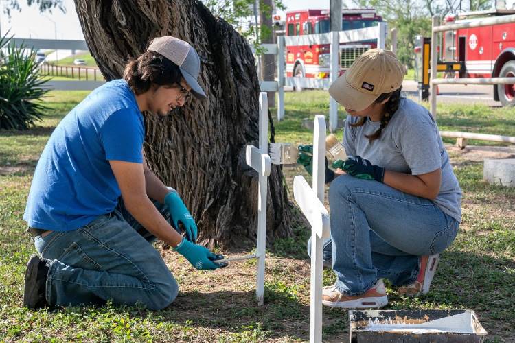 UTRGV students volunteer at the Restlawn Cemetery in Edinburg on Monday, Jan. 16, during MLK Day of Service.