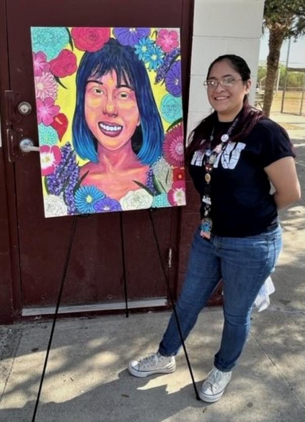 Brownsville artist Gracie Rodriguez stands next to her artwork during a UT Health RGV Pachanga event, as part of the Vida Saludable initiative. Vida Saludable is a healthy lifestyle campaign that showcases local artists and their talents. The goal is to promote health and well-being by showcasing the talents of community members for positive health outcomes. (Photo Courtesy of South Texas Health Disparities Project)