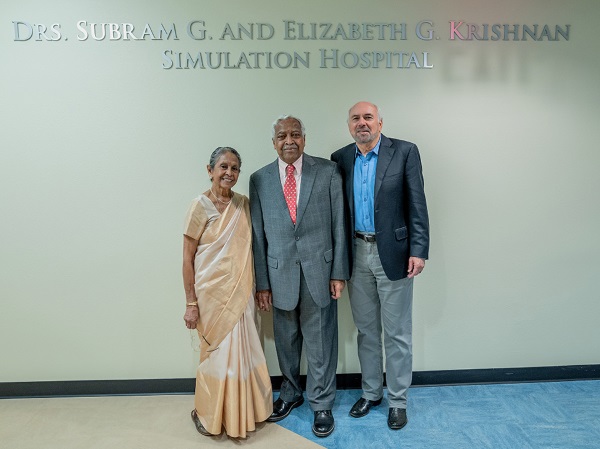 Drs. Subram G. and Elizabeth G. Krishnan with UTRGV President Guy Bailey at an unveiling event for the renaming of the university's simulation hospital in Harlingen, which will now be called The UTRGV Drs. Subram G. and Elizabeth G. Krishnan Simulation Hospital. Retired practitioners and longtime supporters of UTRGV, the Krishnans have prioritized improving healthcare in the Rio Grande Valley, primarily by supporting the enhancement of academic medicine and student success through the UTRGV School of Medicine. (UTRGV Photo by Paul Chouy)