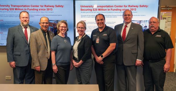 From left: Dr. Thomas B. Spencer, UTRGV associate vice president of Research Operations; Dr. Ala Qubbaj, dean of the UTRGV College of Engineering and Computer Science; Amy Hamilton, UTCRS advisory board member and principal engineer at Trinity Industries; Kim Bowling, UTCRS advisory board member and director of Wayside Diagnostics at CSX Transportation; Dr. Constantine Tarawneh, senior associate dean of the UTRGV College of Engineering and Computer Science and UTCRS director; Dr. Gary Fry, UTCRS advisory board member and vice president at Fry Technical Services Inc.; and Dr. Heinrich D. Foltz, UTRGV electrical and computer engineering professor. Board members not pictured are Kari L. Gonzales, president and CEO of MxV Rail; Edward "Ed" Boyle Jr., vice president of engineering at Norfolk Southern Corp.; and Dr. Alan Calegari, president and CEO director at MERMEC Inc. (Courtesy Photo)