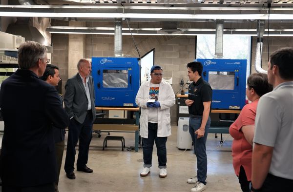 An engineering student shares project insights with the visiting LANL team and UTRGV faculty at an Edinburg manufacturing facility. (UTRGV Photos by Jesus Alferez