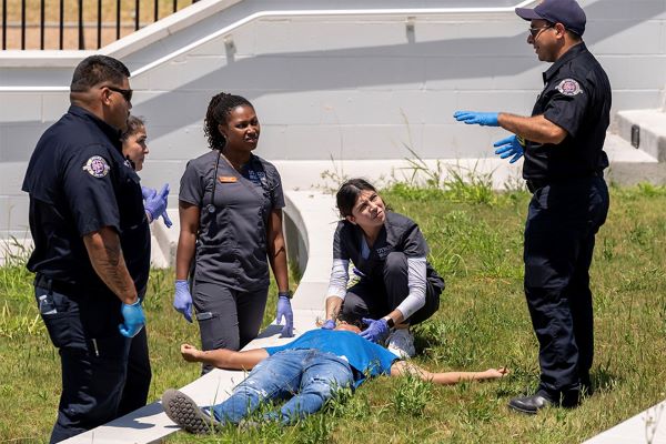 UTRGV School of Nursing students responded alongside EMS personnel and vehicles – police, fire, medical helicopter and ambulances – during a training exercise, Aug. 10, that was a collaboration between UTRGV School of Nursing students and Pharr and Weslaco first responders. (UTRGV Photo by David Pike.)