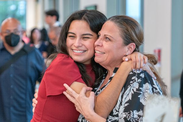 One of 24 new UTRGV Luminary Scholars celebrates the start of her higher educational journey with family during a welcome banquet held in Edinburg on Monday, Aug. 21, for the exclusive group. This will be the second cohort for UTRGV's prestigious scholarship program. (UTRGV Photo by Paul Chouy)