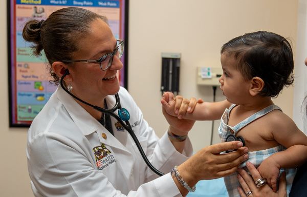 Maintaining good health through preventive care is vital to a successful school year said Dr. Cristel Escalona, a board-certified pediatrician at UT Health RGV and associate professor of pediatrics at the UTRGV School of Medicine. Routine and annual checkups help prevent potential issues and address them promptly so children are less likely to experience unexpected illnesses, which helps ensure they remain focused and engaged in their learning. (UTRGV Photo by Heriberto Perez-Zuniga)