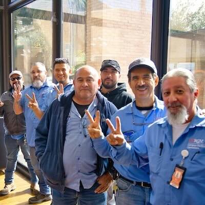 blue shirt campus operations workers