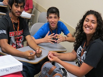 Students sitting around a desk