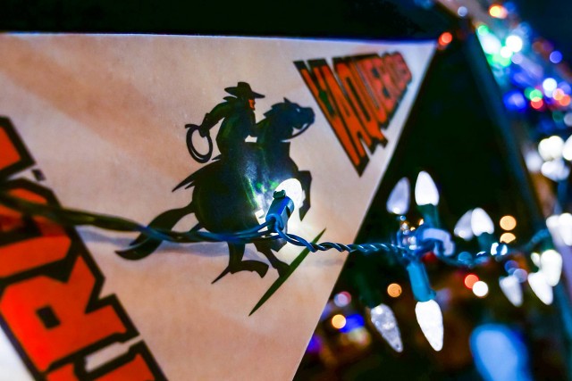 Vaquero Flag decorates car at parade