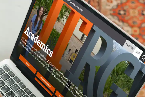 Photo of a laptop screen with a UTRGV webpage opened.